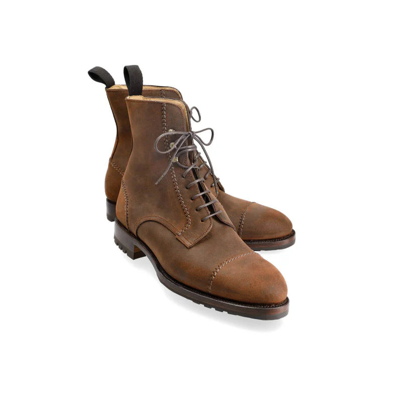 A pair of brown leather lace-up ankle boots with a cap toe and dark pull tabs, shown on a plain white background.