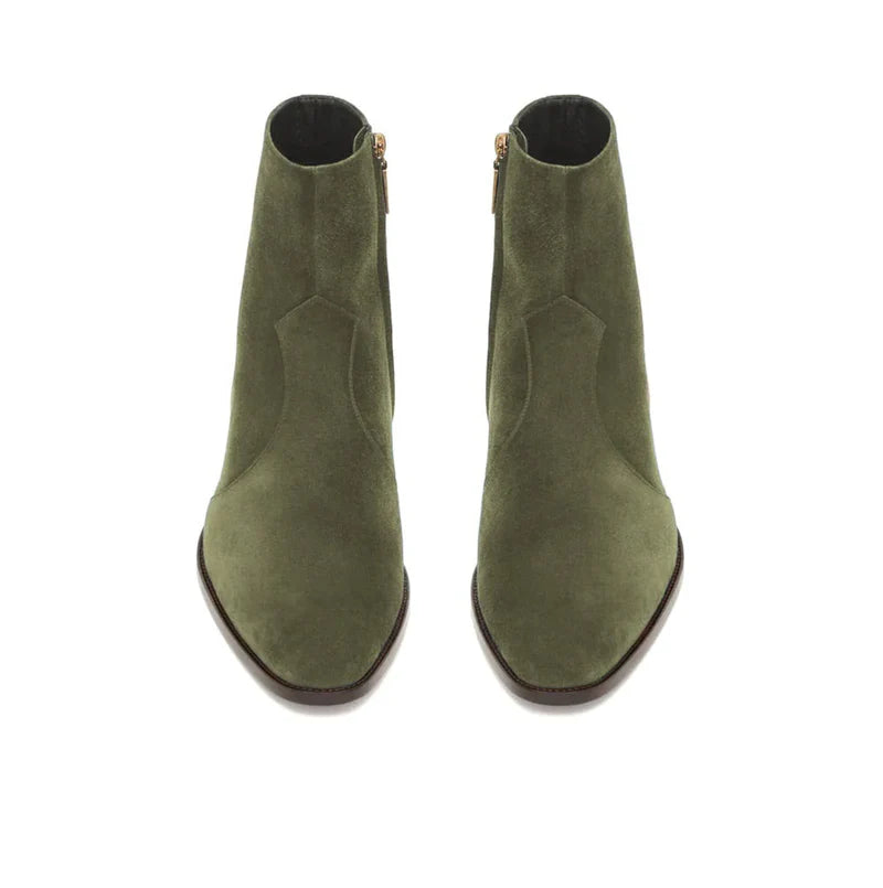 A pair of olive green suede ankle boots with pointed toes and side zippers, shown from a top-down view on a white background.