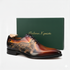 Brown leather shoe with intricate design on a white background, featuring 'Italiana X quisto' branding.